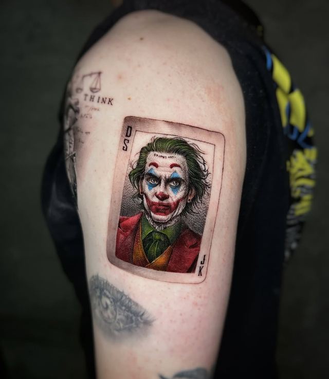Joker playing card – tattoo by DMTcollective, Karmiel