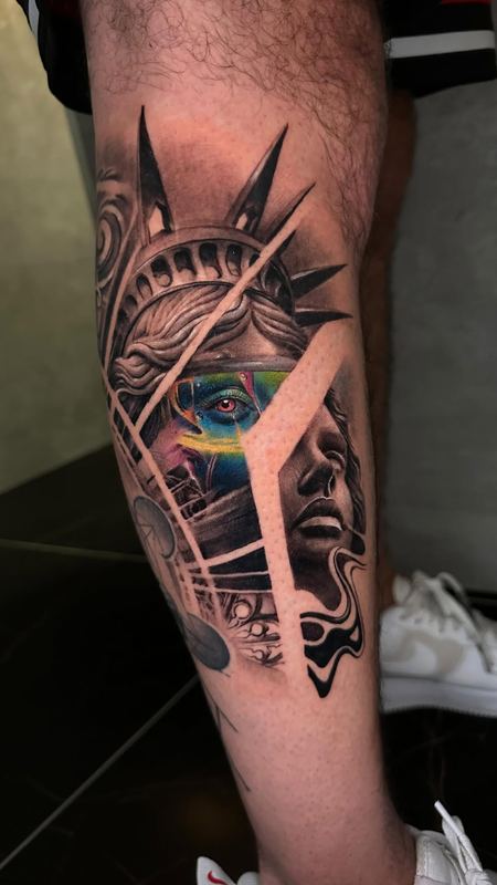 Statue of Liberty, colour-accent calf piece – tattoo by DMTcollective, Karmiel