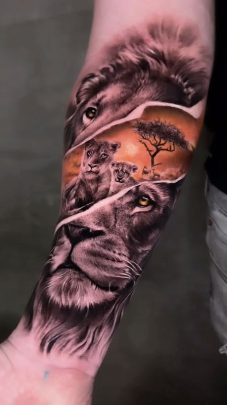 Lion & savanna forearm – DMTcollective tattoo