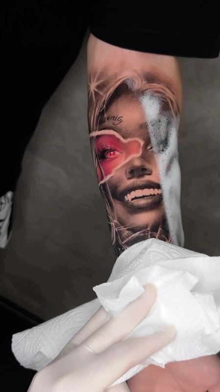 Portrait with red accent, fresh – tattoo by DMTcollective, Karmiel